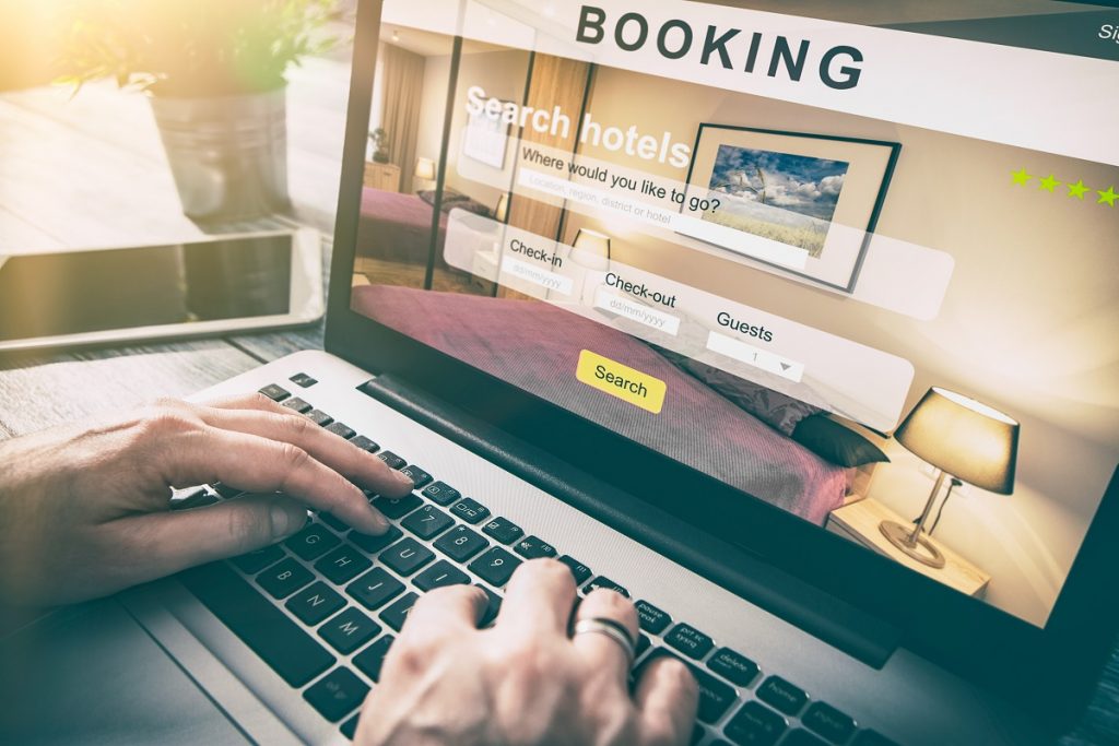 person booking a hotel on a website