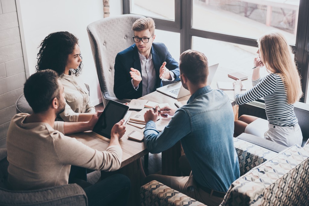 Group of business people discussing