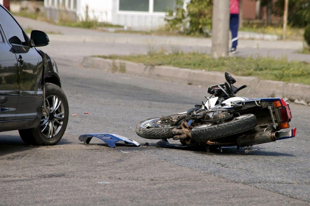 Motorcycle and car crash