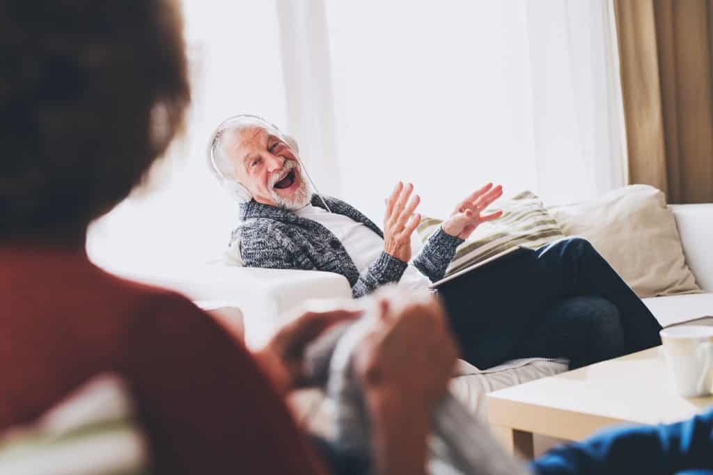 old person listening to music