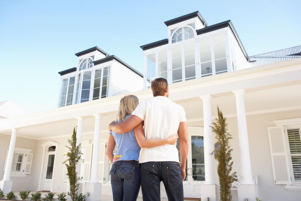 couple admiring home