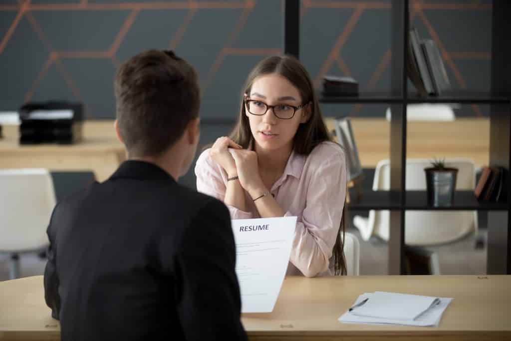 man talking to a woman at the office