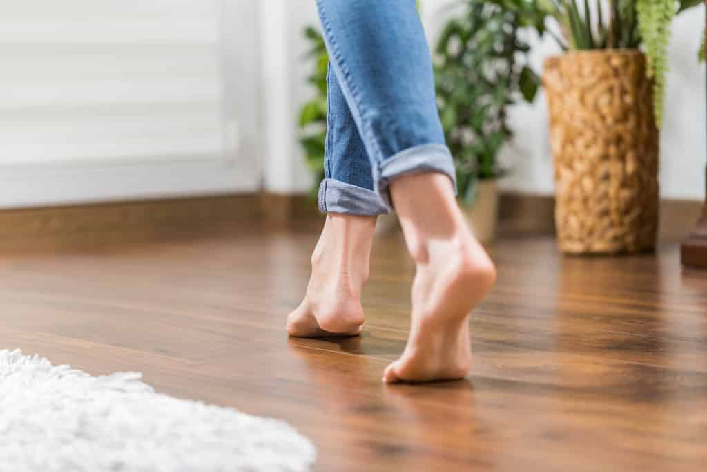 woman walking barefoot