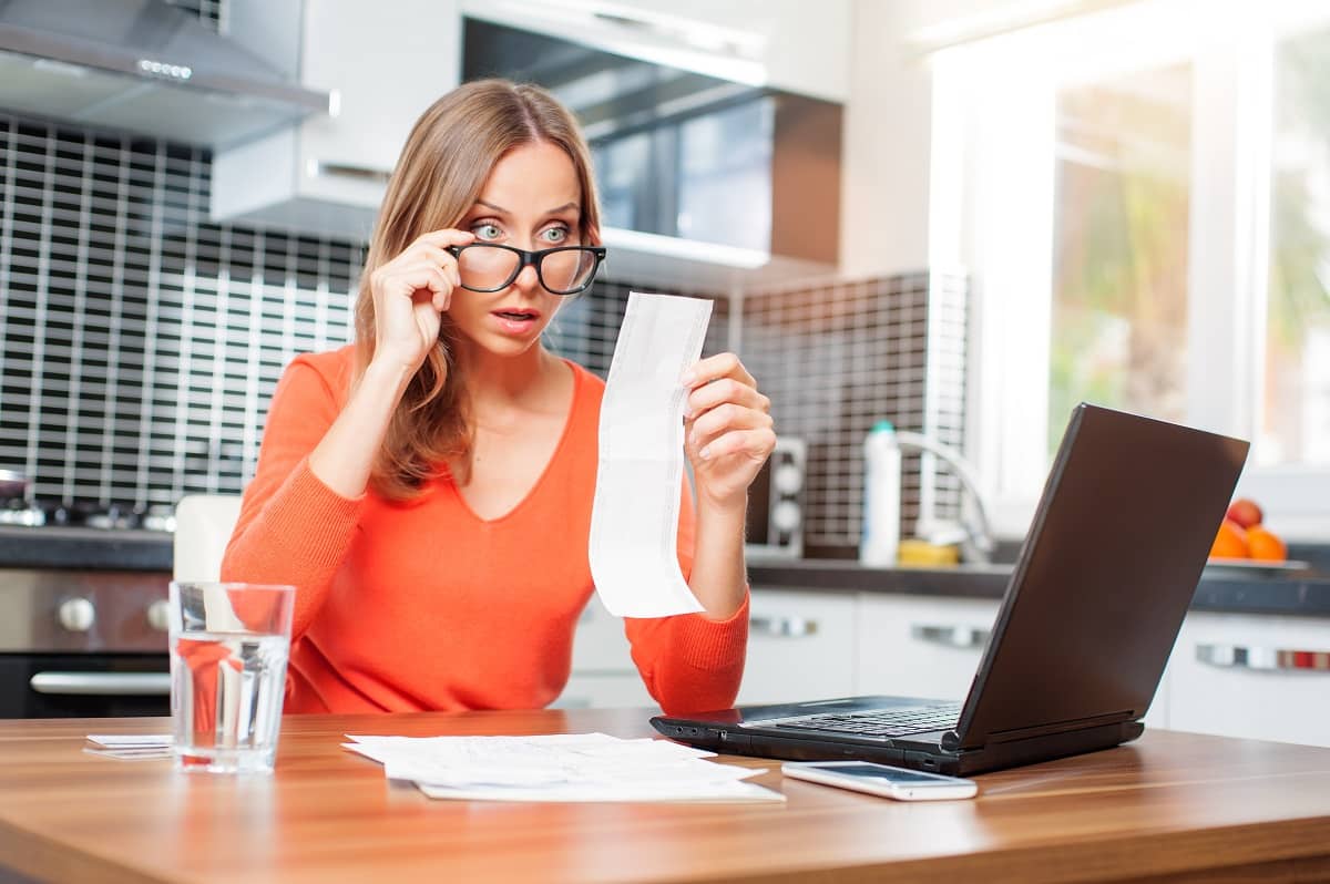 woman checking receipt