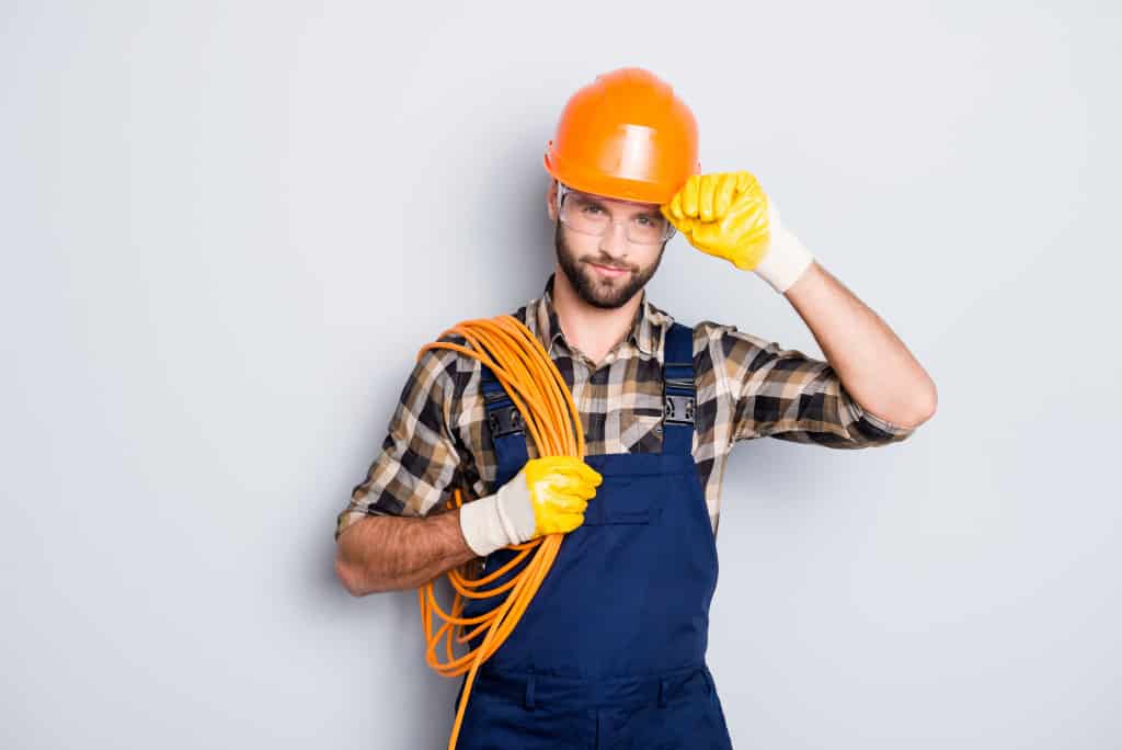 Electrician holding cable wires