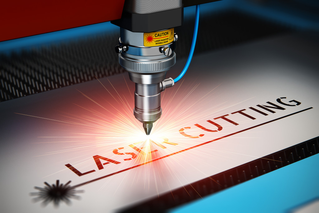 Close up of laser cutting machine writing laser machine 