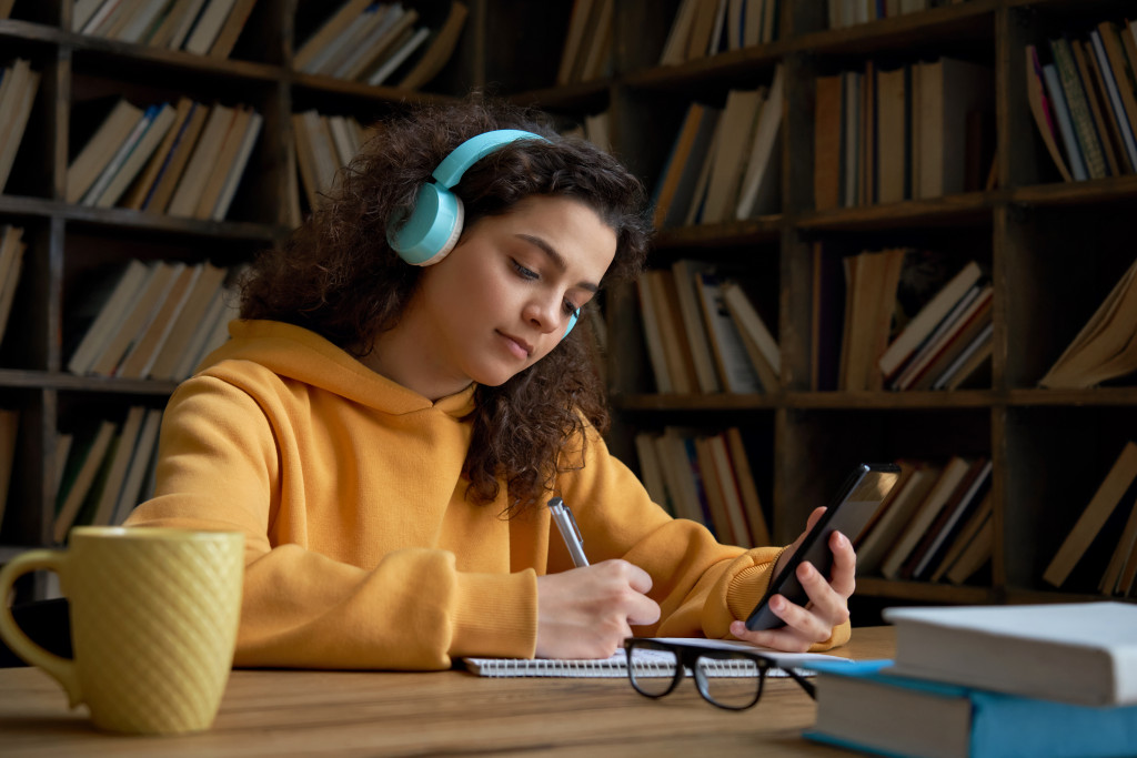 A freelancer using headphones