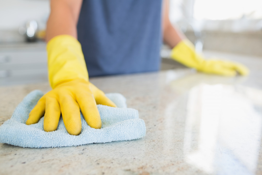 A woman cleaning the house