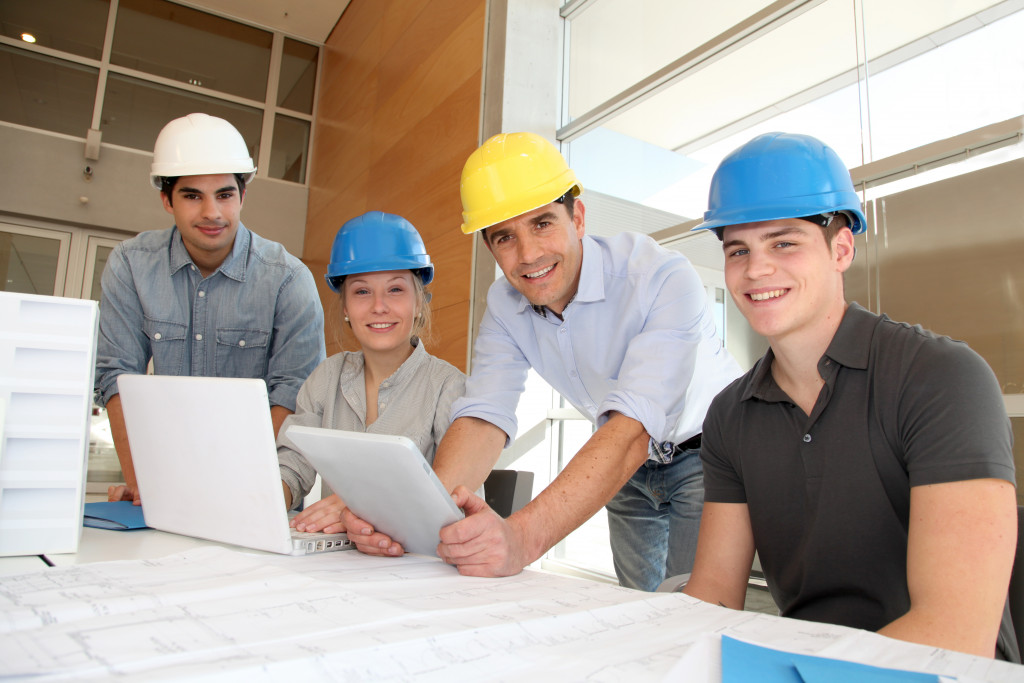 A bunch of contractors taking a test together