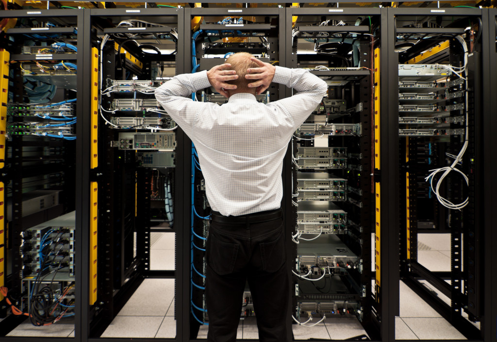 A man looking to clean data center