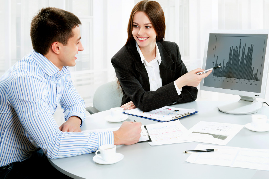 two people in corporate attire