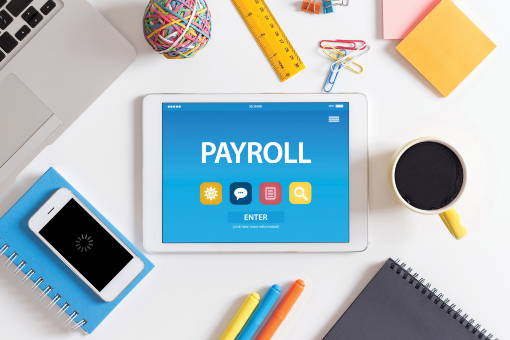 Payroll app on tablet screen