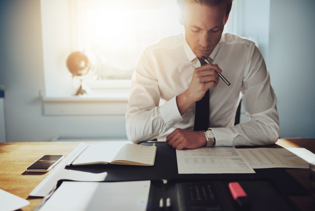 An accountant analyzing financial reports